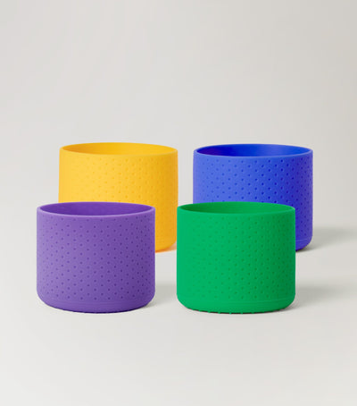 Koh Bottle Bumpers 4pk in yellow, blue, green and purple silicone